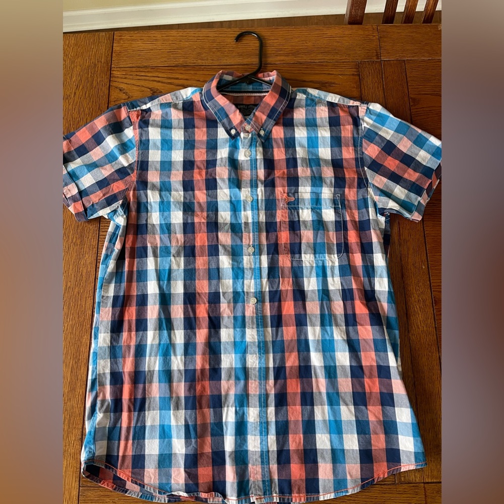 Multiple colored striped designed dress shirt.